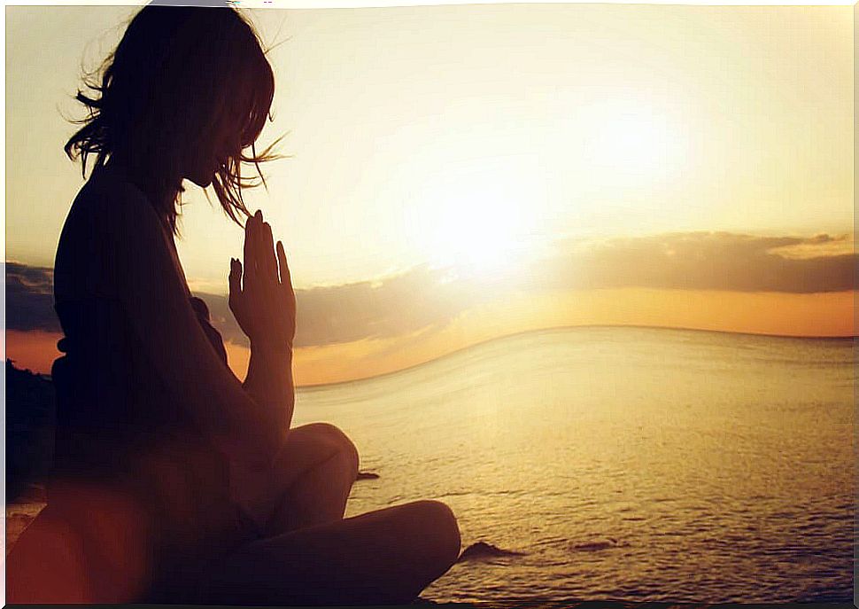 woman doing yoga to find happiness