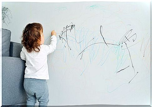 girl painting the wall